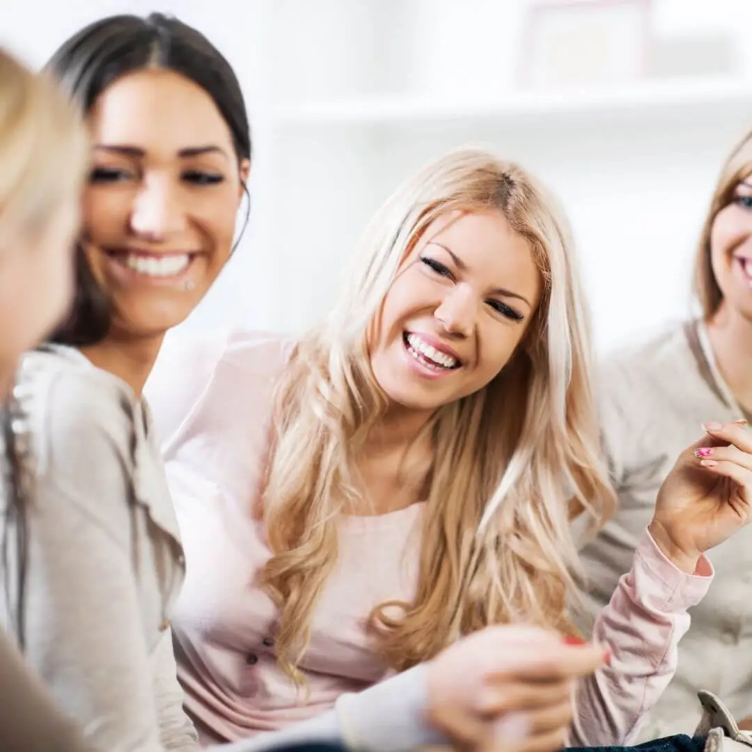 People engaged in thoughtful conversation, representing emotional intelligence and communication skills.